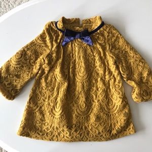 Lace dress. Mustard with blue velvet bow